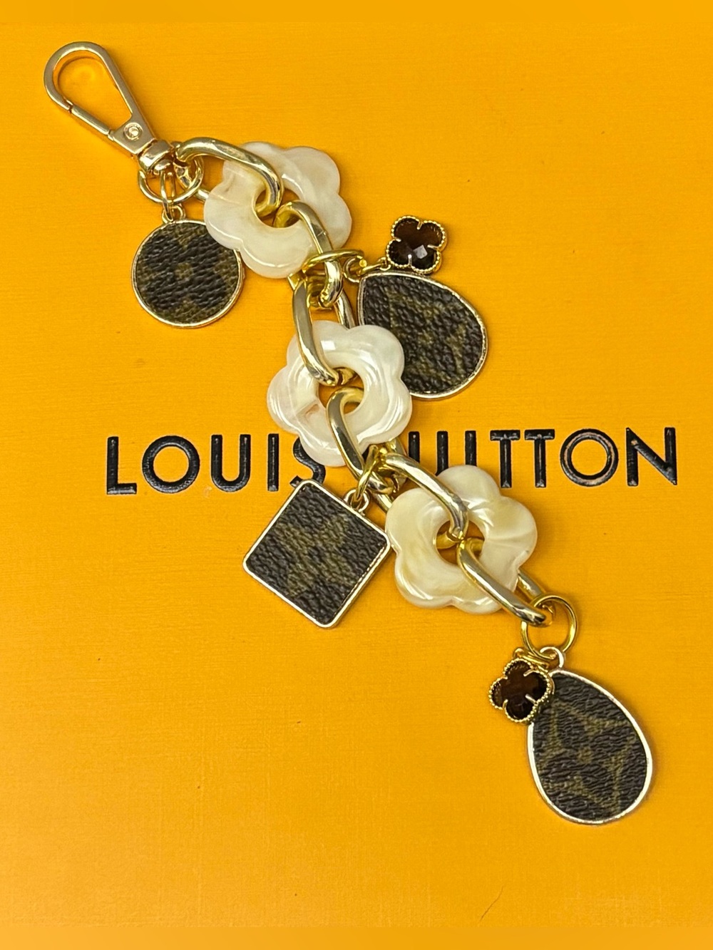 Louis Vuitton Monogram Bag Charm, Cream Flowers, Rhinestone Clovers 7 in.